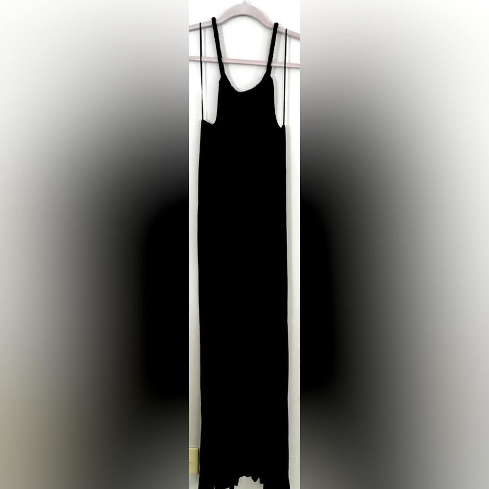 Dressy or casual dress. Only wore once to wedding.